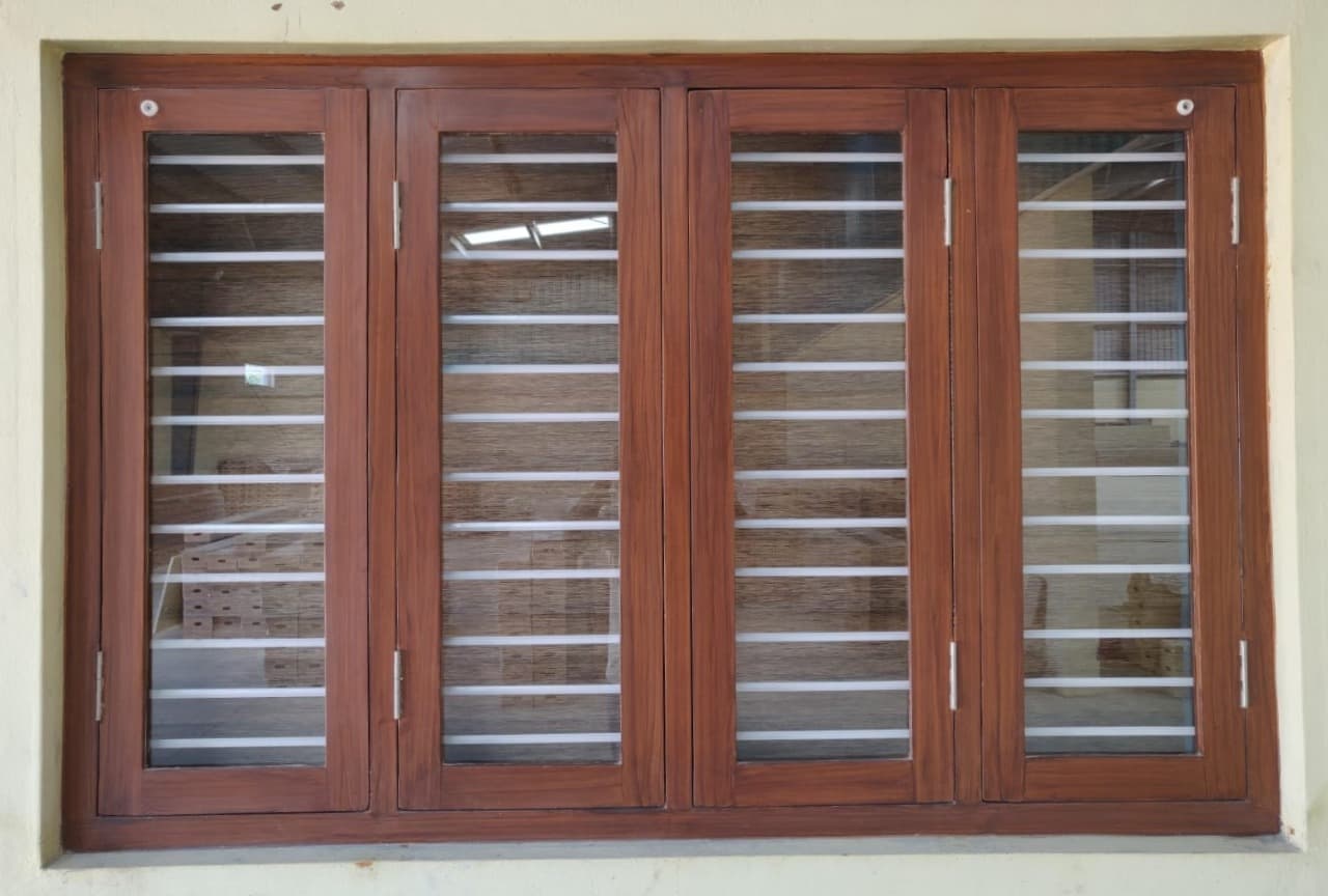 Four-panel teak window shutter